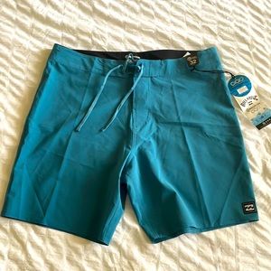 Mens short length swim shorts. New with tags. Billabong size 32